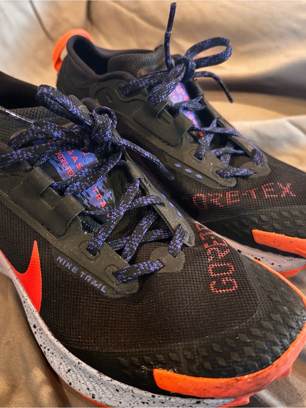 Nike Black Trail Shoes with Orange and Purple Details